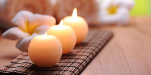 Elevation Med Spa Lone Tree Colorado three lit candles at a spa